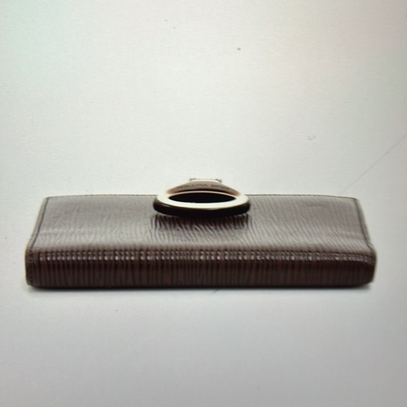 Vintage Louis Vuitton Moka Brown Epi
Leather Agenda Cover PM
Condition: Great - Picture 5 of 16